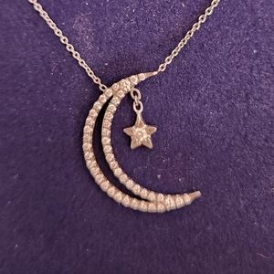 Roberto Coin Crescent Moon diamond necklace with a star dangle